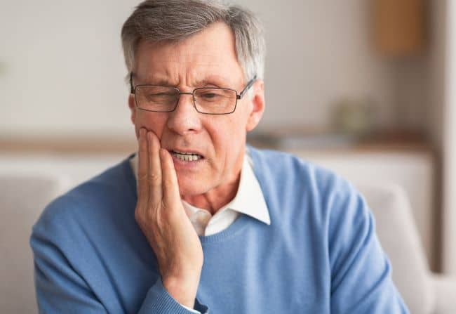 Elderly man with toothache.