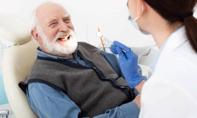 Senior man dental treatment.